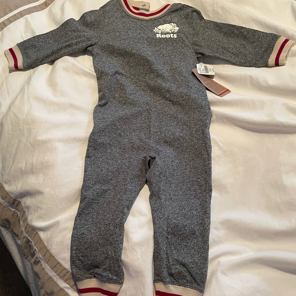 Cute warm and cozy Roots baby onesie.